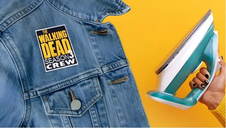 iron-on embroidered patch applied to denim jacket using heat press